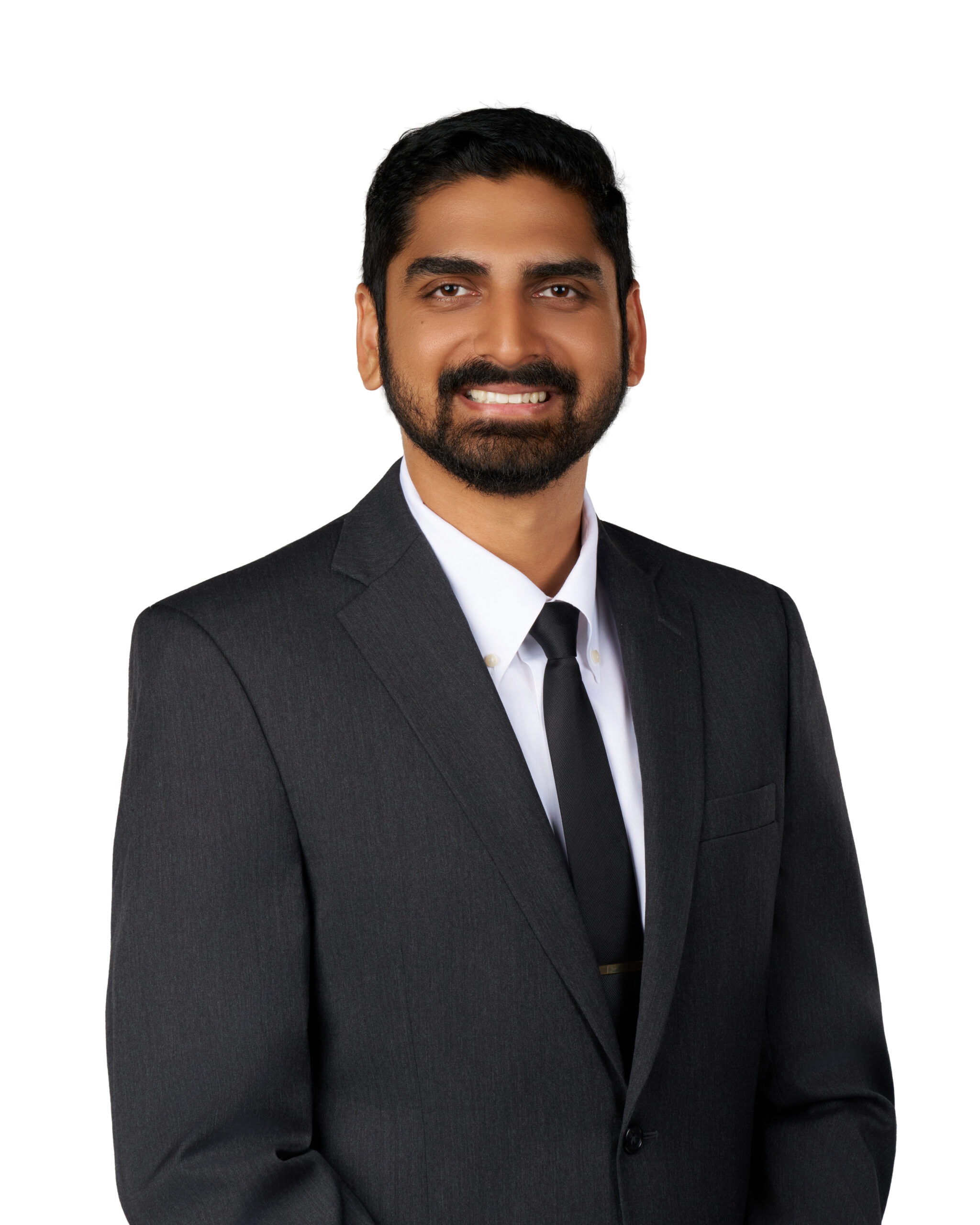 Dr. Bandatmakur poses for a professional photograph as an introduction to the community he serves.